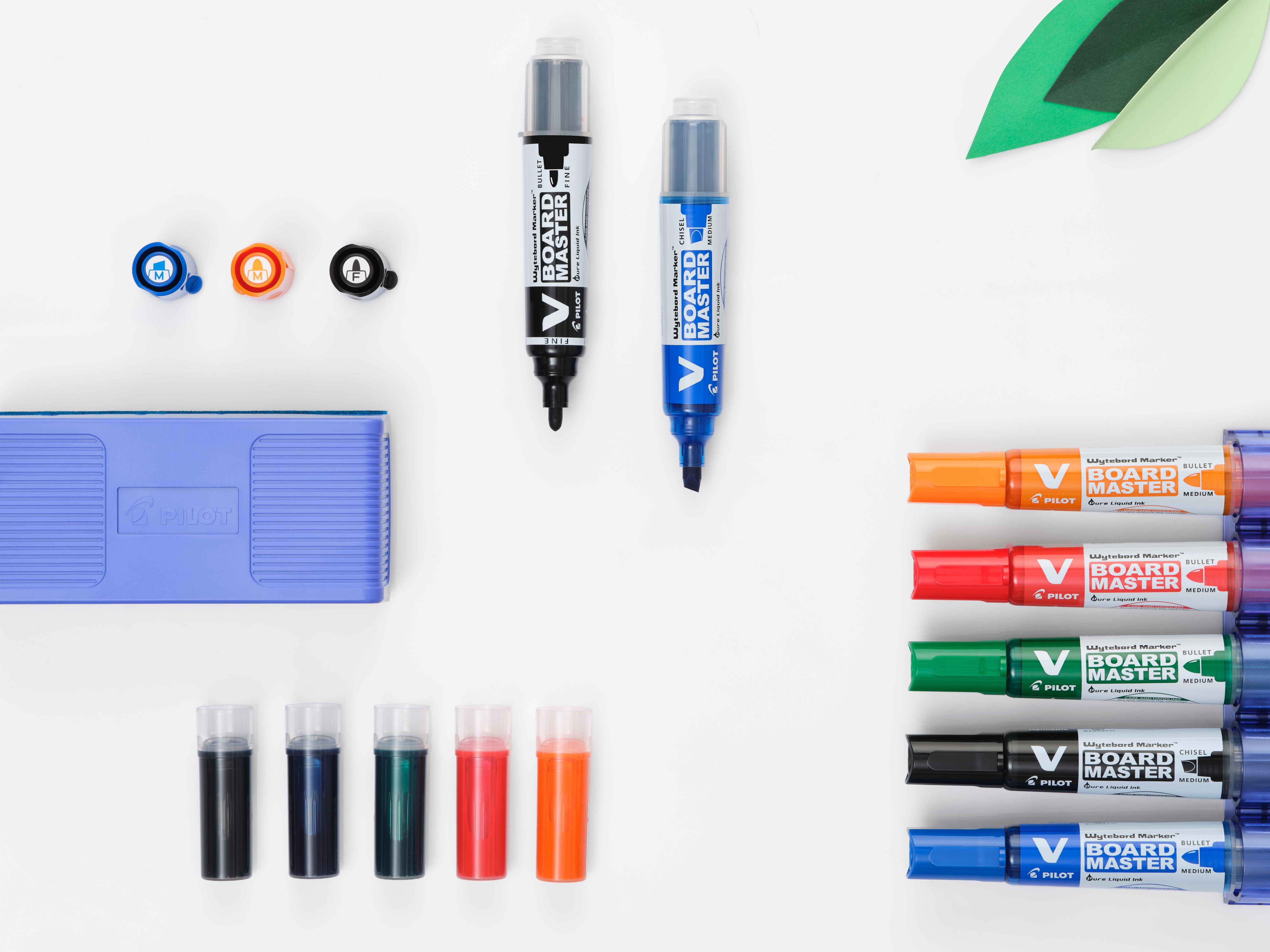 Array of PILOT V Board Master whiteboard markers, showcasing various vibrant colours, with a PILOT Wyteboard Eraser laying on whiteboard