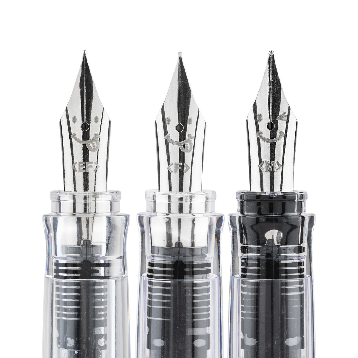 Close up of 3 PILOT pen foutain pens showcasing the feed and 3 different nib sizes