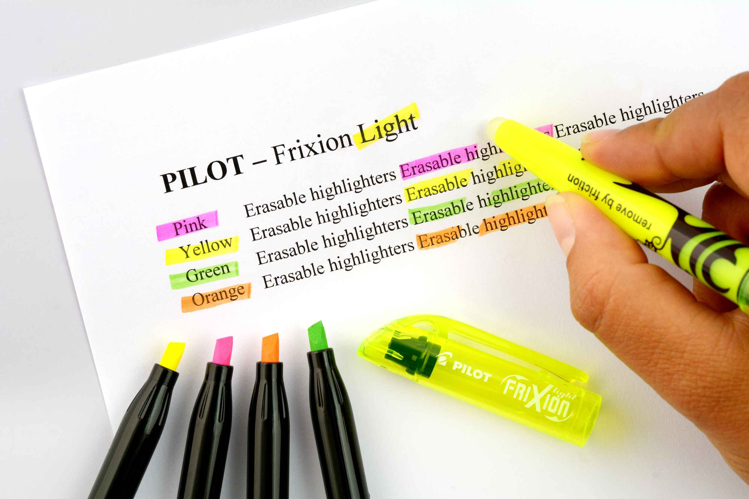 A notebook featuring swatches of PILOT FriXion erasable highlighters in bright shades, highlighting their smooth application and ideal use in HSC exam revision.