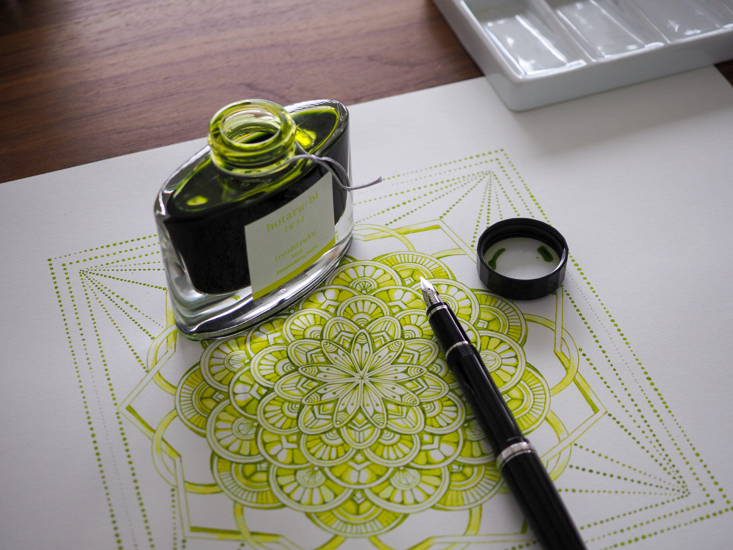 Pilot Falcon fountain pen and Pilot iroshizuku ink in yellow-green, called hotaru-bi, which translates to Firefly Glow in Japanese,  used to draw mandala for therapeutic benefit