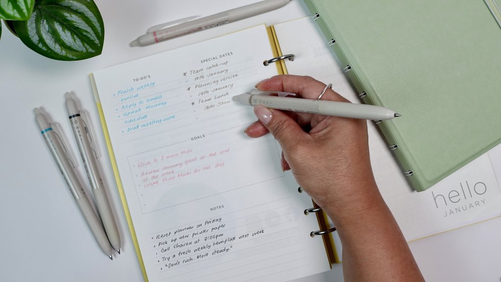 Planner setup with FriXion pens used for everyday work planning.