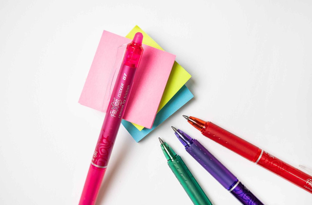 Pilot FriXion Clicker Pens with Post-it notes, showcasing their ideal use for note taking.